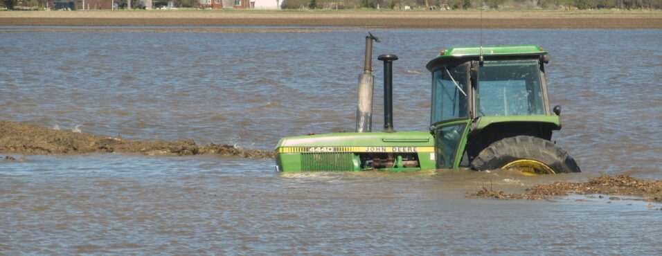 tractor in flooded field, water and climate change